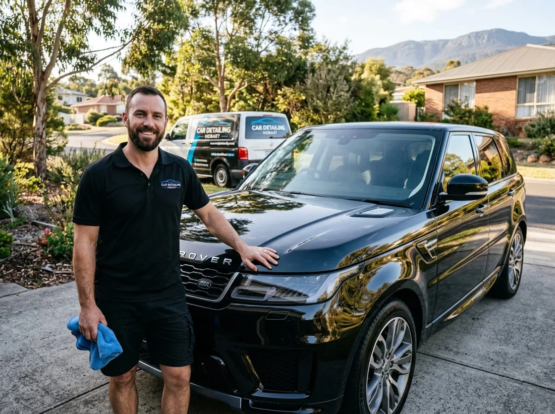 Mobile detailer beside a fully detailed SUV in Hobart